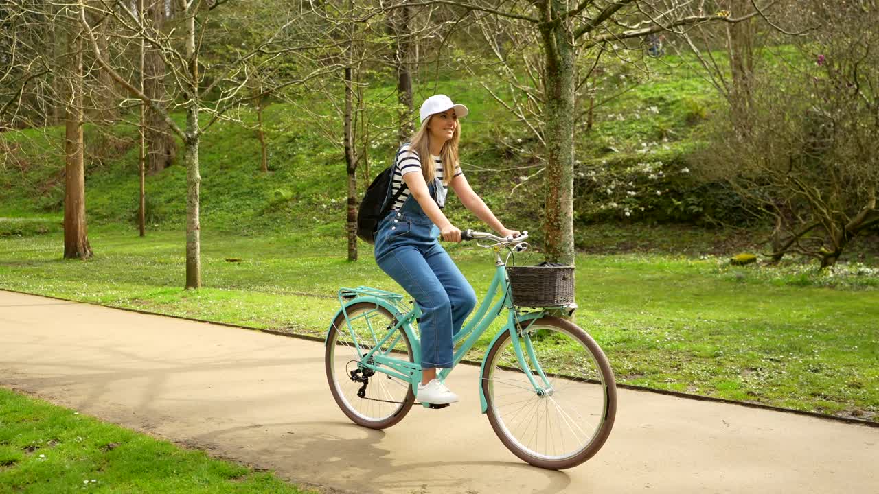 Woman riding a bike in the park