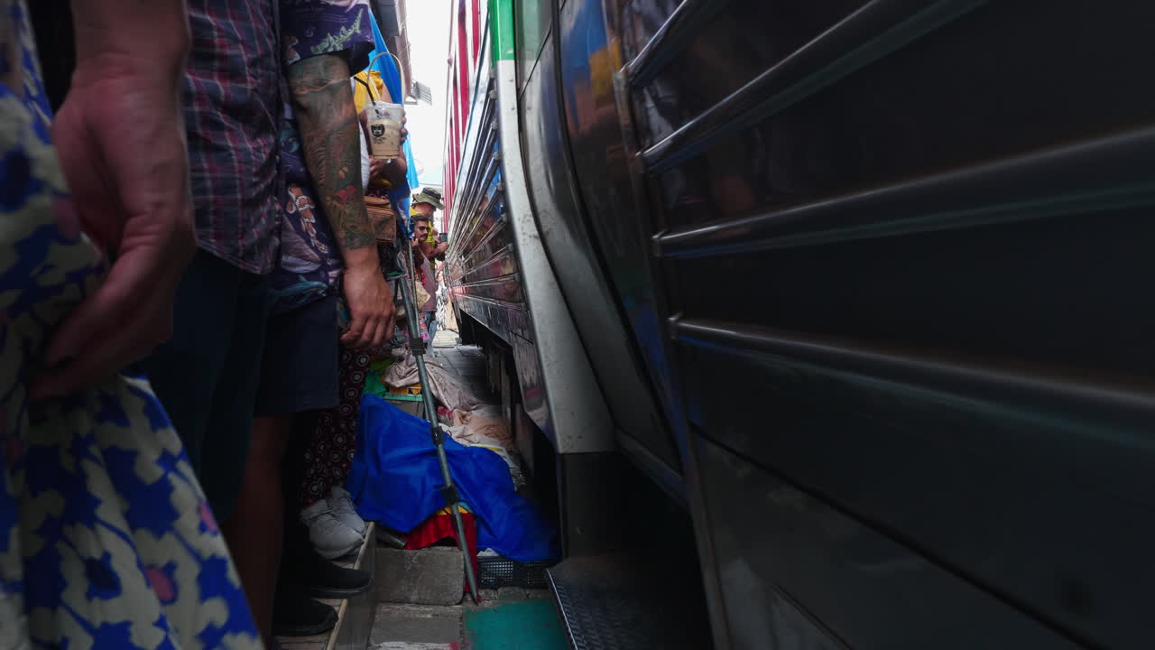 People waiting at a train station