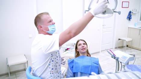 woman having visit at the dentist. dentist curing a female patient in the stomatology
