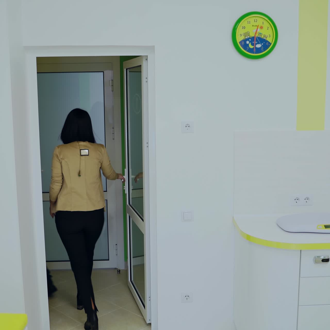 Doctor and family in office