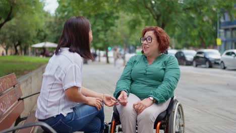 Two women conversing outdoors