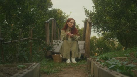 woman in a garden enjoying the fresh air