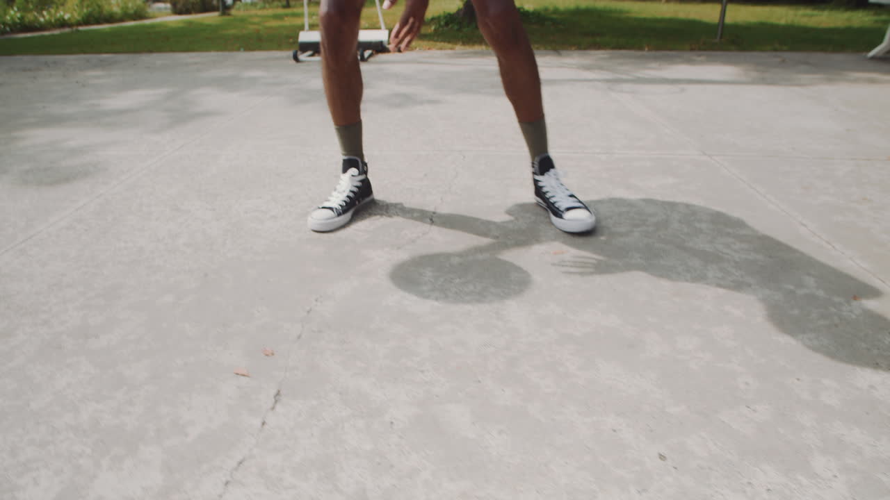 Active Men Playing Streetball after Work