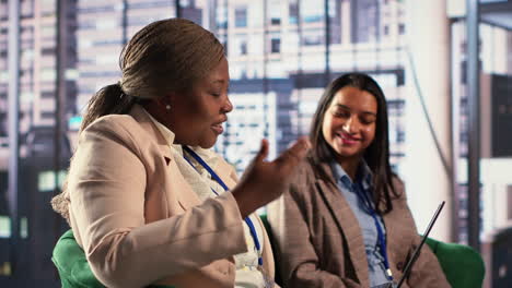 businesswomen in conversation
