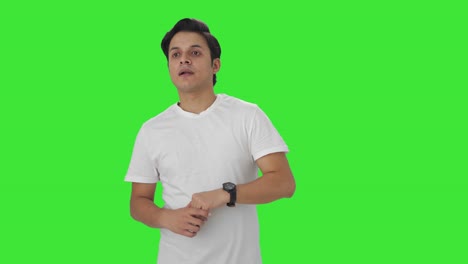 indian man waiting for someone green screen