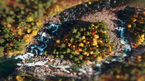 aerial footage of a river winding through a rocky landscape, with rapids creating whitewater against the stones