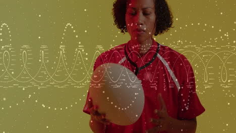 holding rugby ball, person in red jersey with animation data visualization overlay