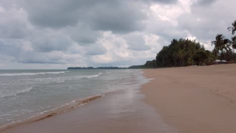 natural-sea-wave-water-with-foam-on-the-sandy-beauty-white-beach,-summer-beach-seascape