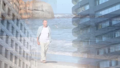 composite video of tall buildings against caucasian senior man walking at the beach