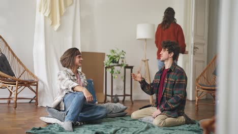 young couple moving in, talking