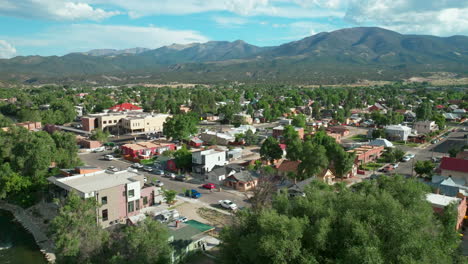 Salida-Colorado-aerial-cinematic-drone-mid-summer-downtown-S-Lime-Mill-near-Buena-Vista-on-Arkansas-River-Riverside-Park-Scout-surfing-biking-hiking-rafting-Rocky-Mountain-forward-neighborhood-motion