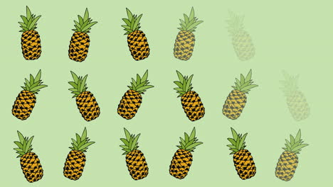 animation of single pineapples floating on green background