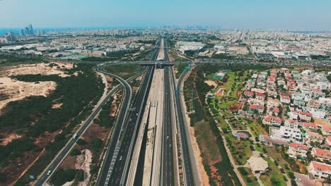 Wide-aerial-of-roads-and-cities