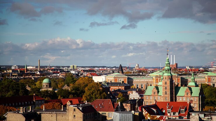 Copenhagen Skyline Timelapse: Historic Downtown with Spire Tower & Cloudy Day