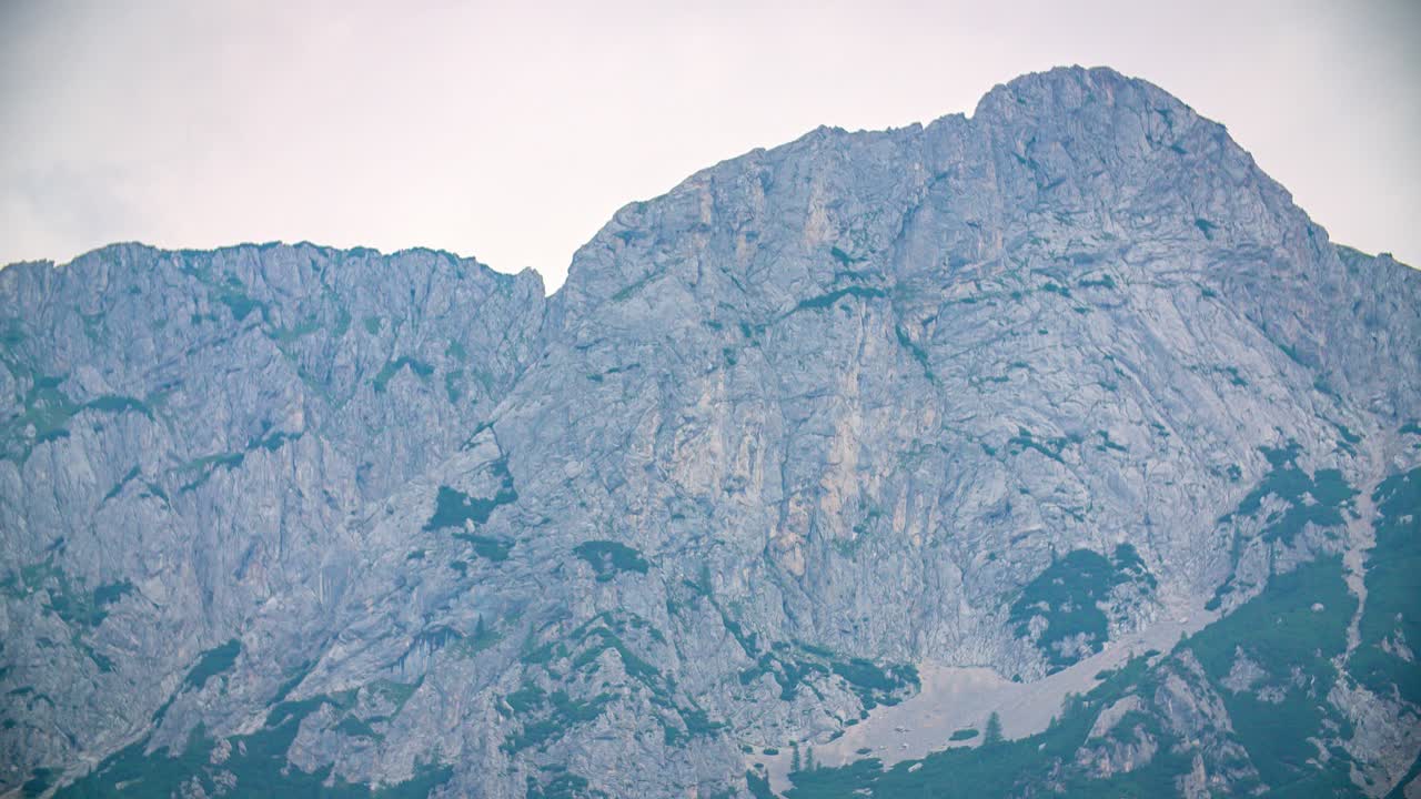 Pan up shot of a mountain far away