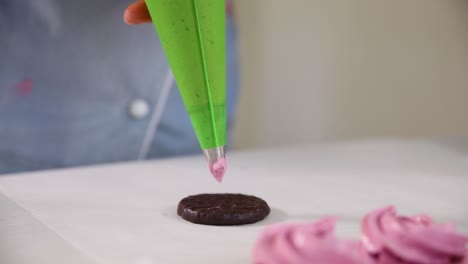 decorating marshmallows with icing