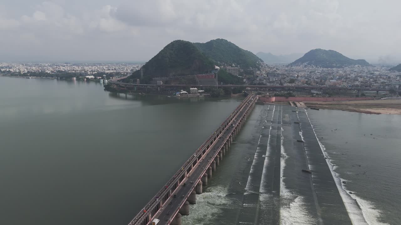 Aerial View of a Bridge Over a River in an Indian City