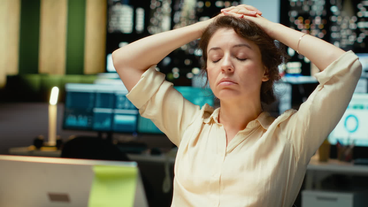 Vertical Video Businesswoman struggling to stay awake after an intense workload