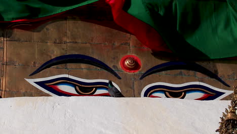 close up buddha eyes at swayambhunath stupa in kathmandu, nepal.