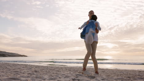 Family,-beach-and-father-spin-child-outdoor