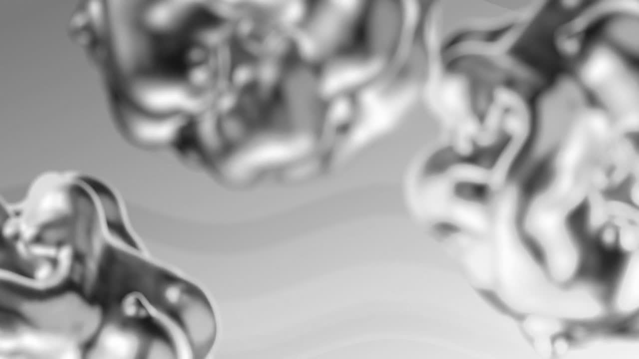 formas orgánicas metálicas grises fundidas que emergen y se mueven sobre un fondo gris ondulado