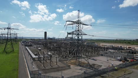 transmission towers grain electrical substation kent uk rising drone aerial view