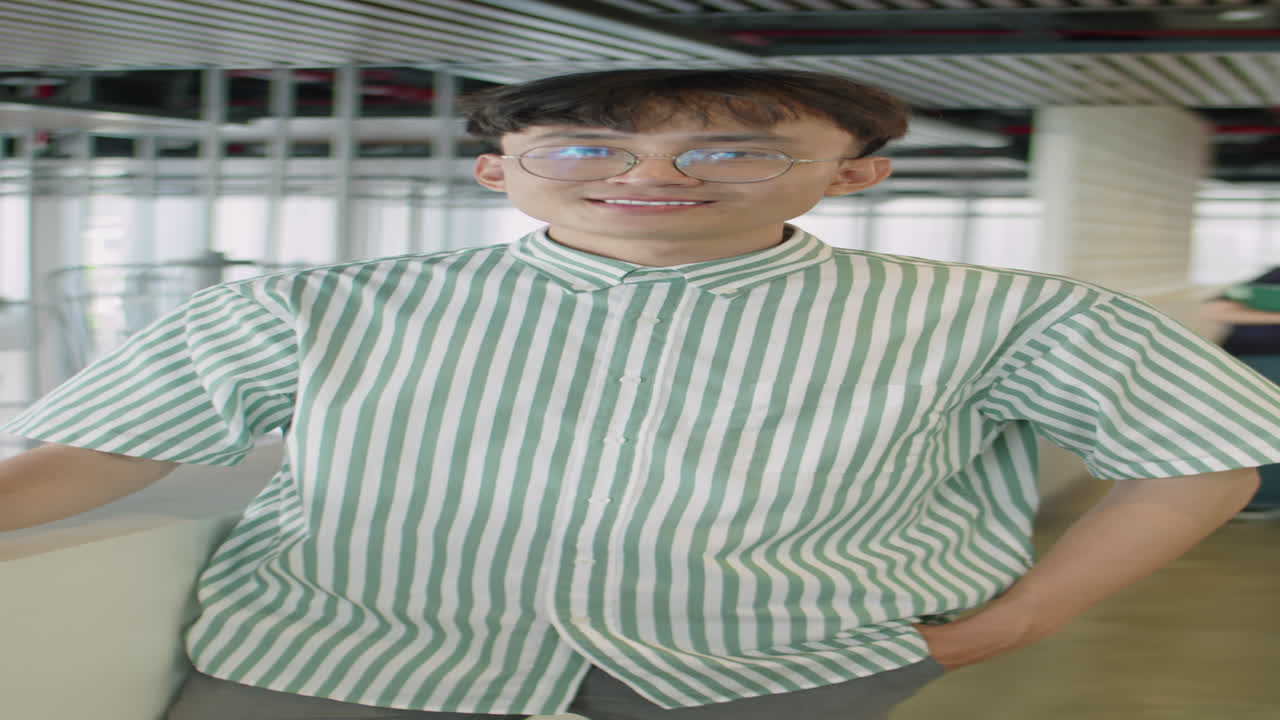 Portrait of Gen Z Asian Guy in Business Center