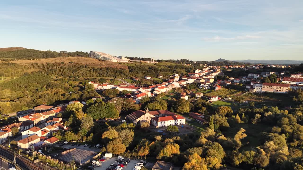 An aerial view of the Collegiate Church of Santa María la Real de Sar. The video, shot with a drone in 4K resolution. A historic Romanesque church located in Santiago de Compostela, Spain