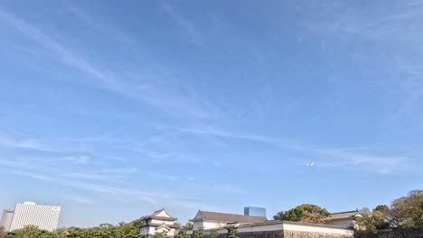 time-lapse of osaka castle with moving clouds