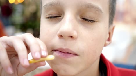 boy eating chips