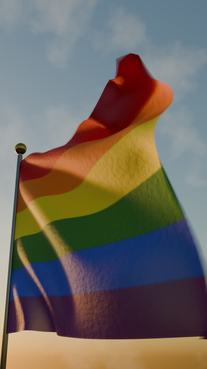 Waving peace flag lgbtq at sunset in the air during pride month