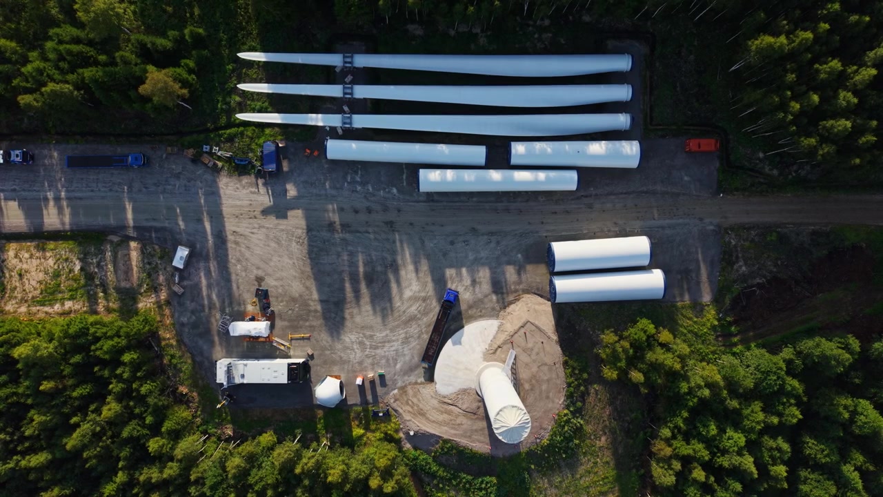 Aerial view of turbine components shows investment in local electricity supply