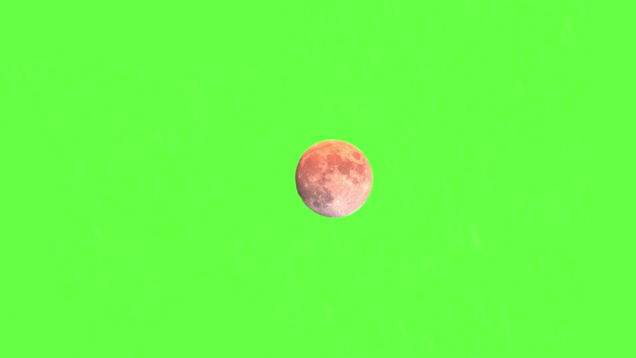 Small Full Moon Changing Colour On A Green Screen Background, Astro Timelapse Concept