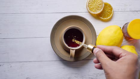 golden tea with lemon and honey