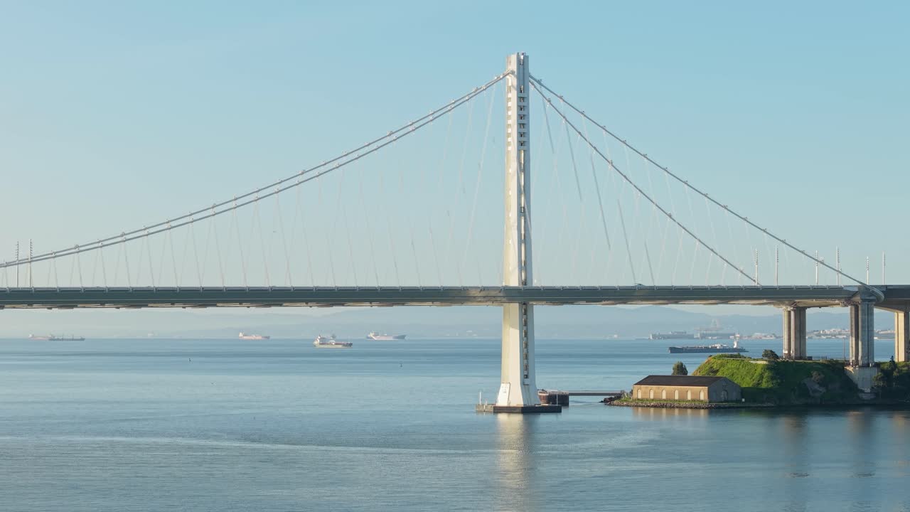 A rotating panning aerial view of the San Francisco Bay Bridge. Shot in 4K.