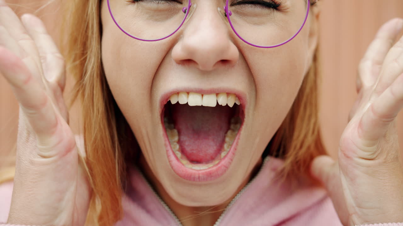 Woman with Open Mouth and Purple Glasses