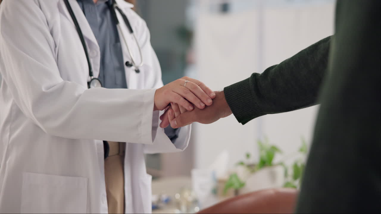Doctor comforting patient