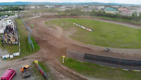 4k drone video of sprint car racing at mitchell raceway in fairbanks, ak during sunny summer evening-5