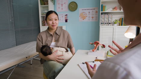 mother and baby in doctor's office