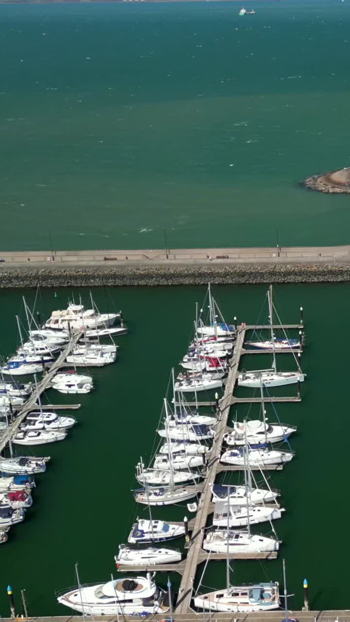 Passing social ratio aerial video of Bangor Marina in Bangor, County Down in Northern Ireland. Filmed in 1080x1920 and with Rec709 color