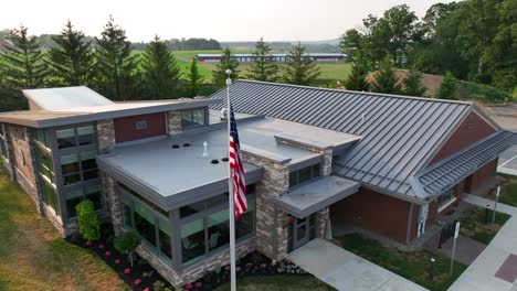 Government-township-municipal-building-in-USA-with-American-flag-outside