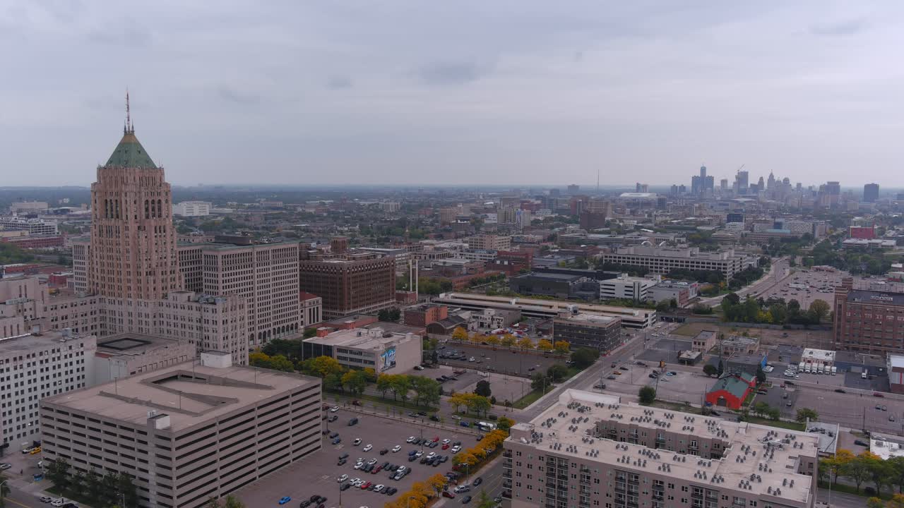 Pan left drone shot of the New Center area in Detroit, Michigan