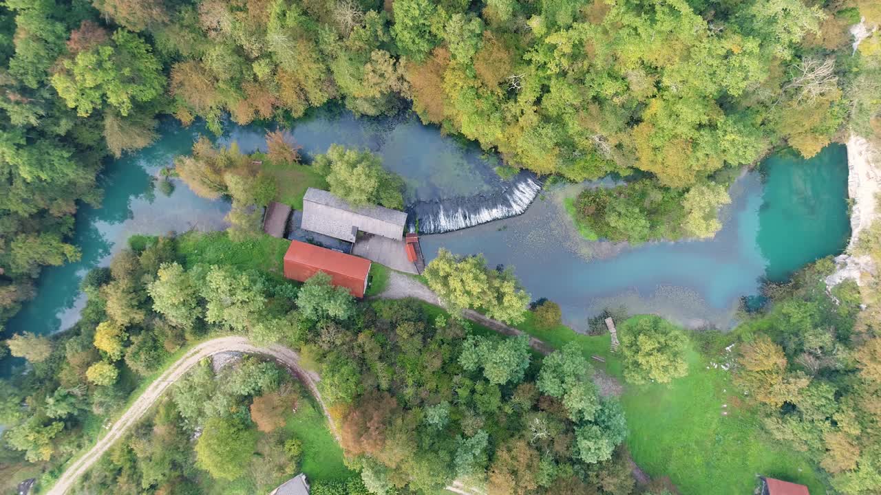 Overhead Drone Shot Of House Near Lahinja River In Metlika, Slovenia