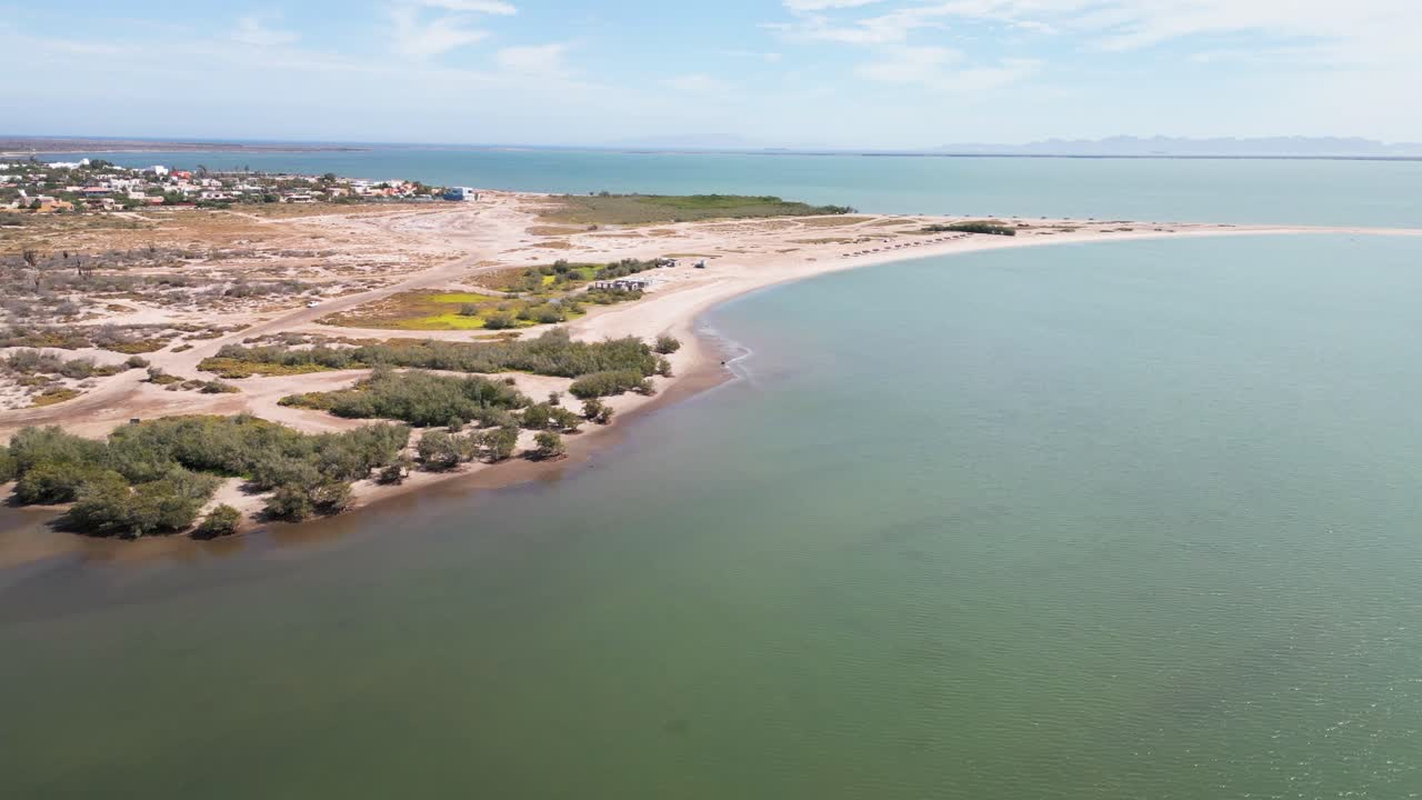 Sandy coastline and blue water in La Paz, El Centenario, Baja California Sur, Mexico