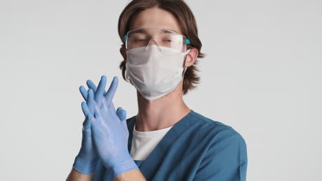 Caucasian-man-in-front-of-camera-on-white-background.