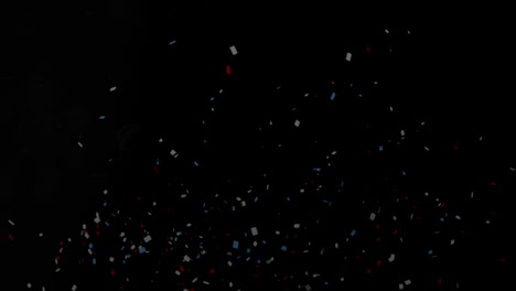 animación de confeti cayendo sobre el estandarte de texto de navidad contra un fondo negro