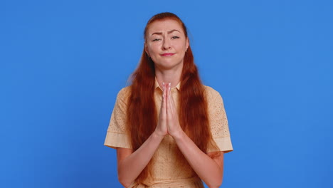 attractive woman praying looking upward making wish begging apology asking help forgive me