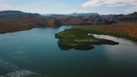 aerial drone shot of a lake in the sonoran desert in arizona