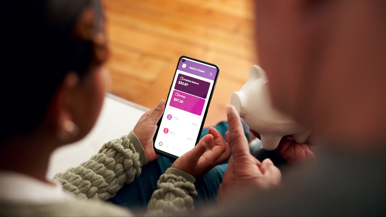 Family saving money with mobile banking app