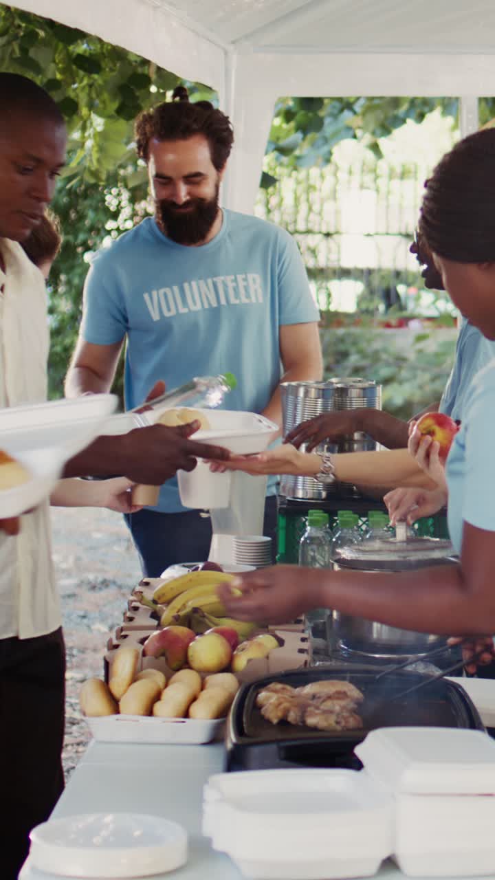 Vertical video Volunteers supporting the poor and needy
